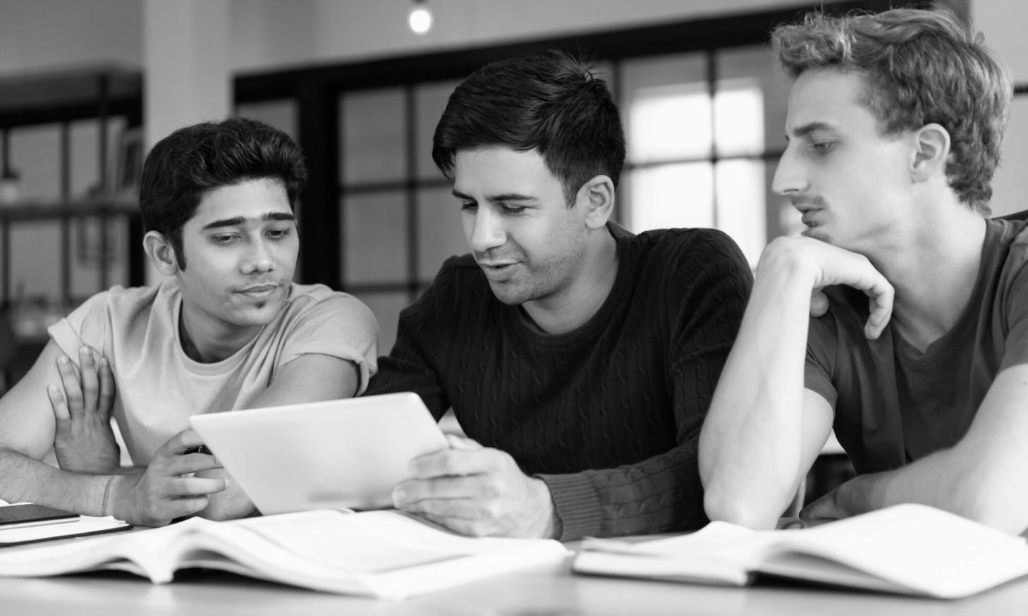 Students working on financial modeling exercises during intensive program session